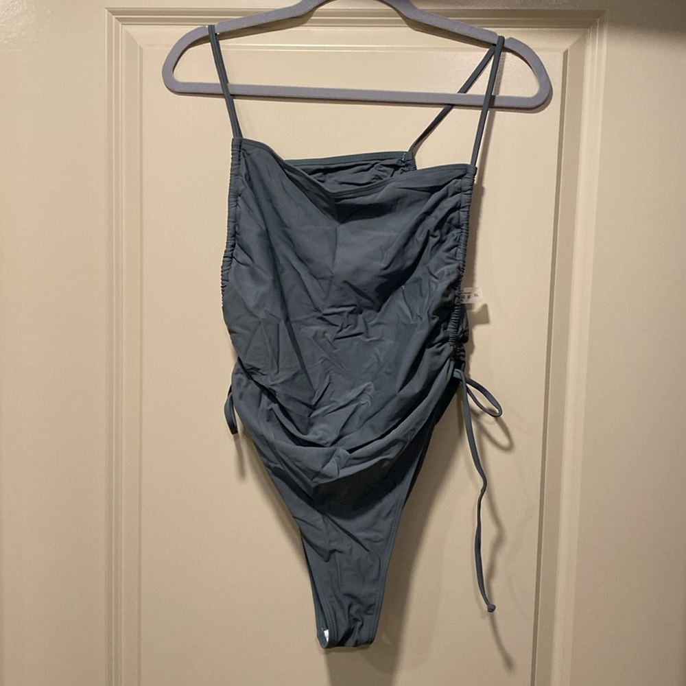 Adjustable high hip one piece